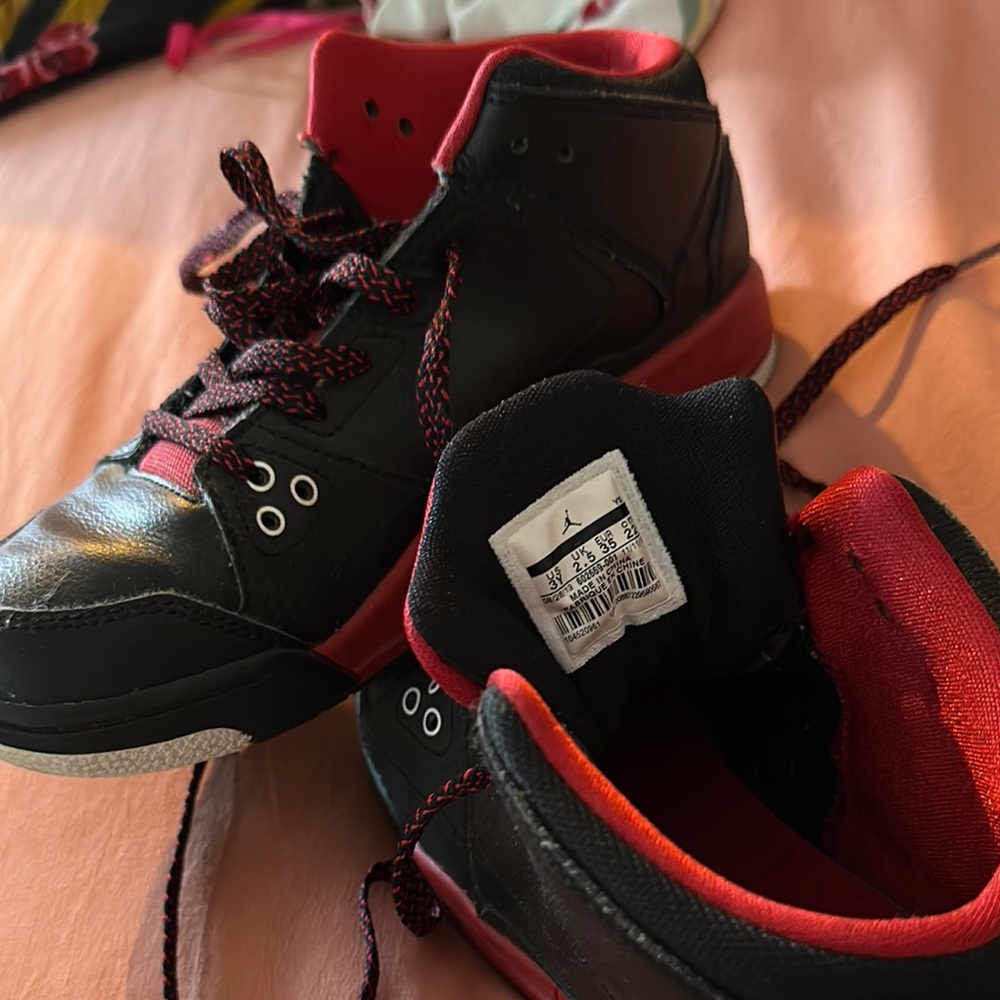 Jordan Black and Red High-Top Sneakers with Stylish Stitching